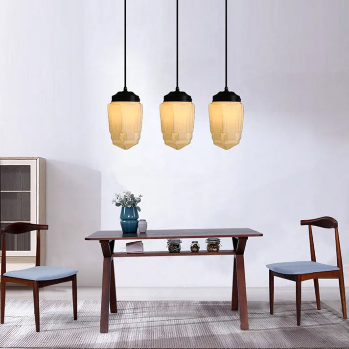 Nowoczesna lampa wisząca o geometrycznym, matowym wzornictwie